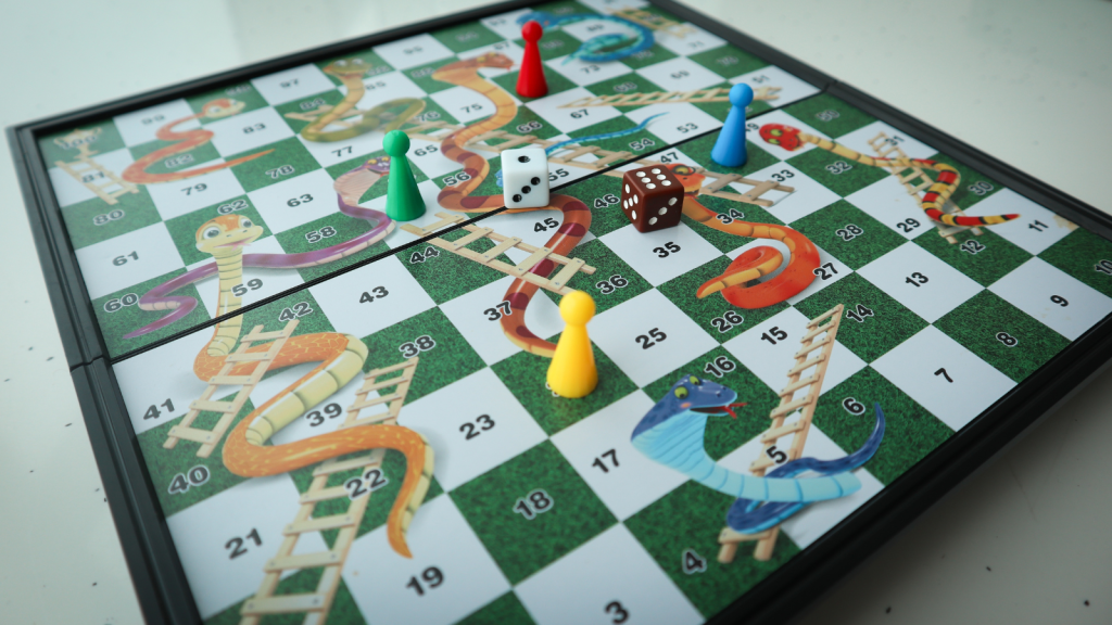 Snakes and ladders board game